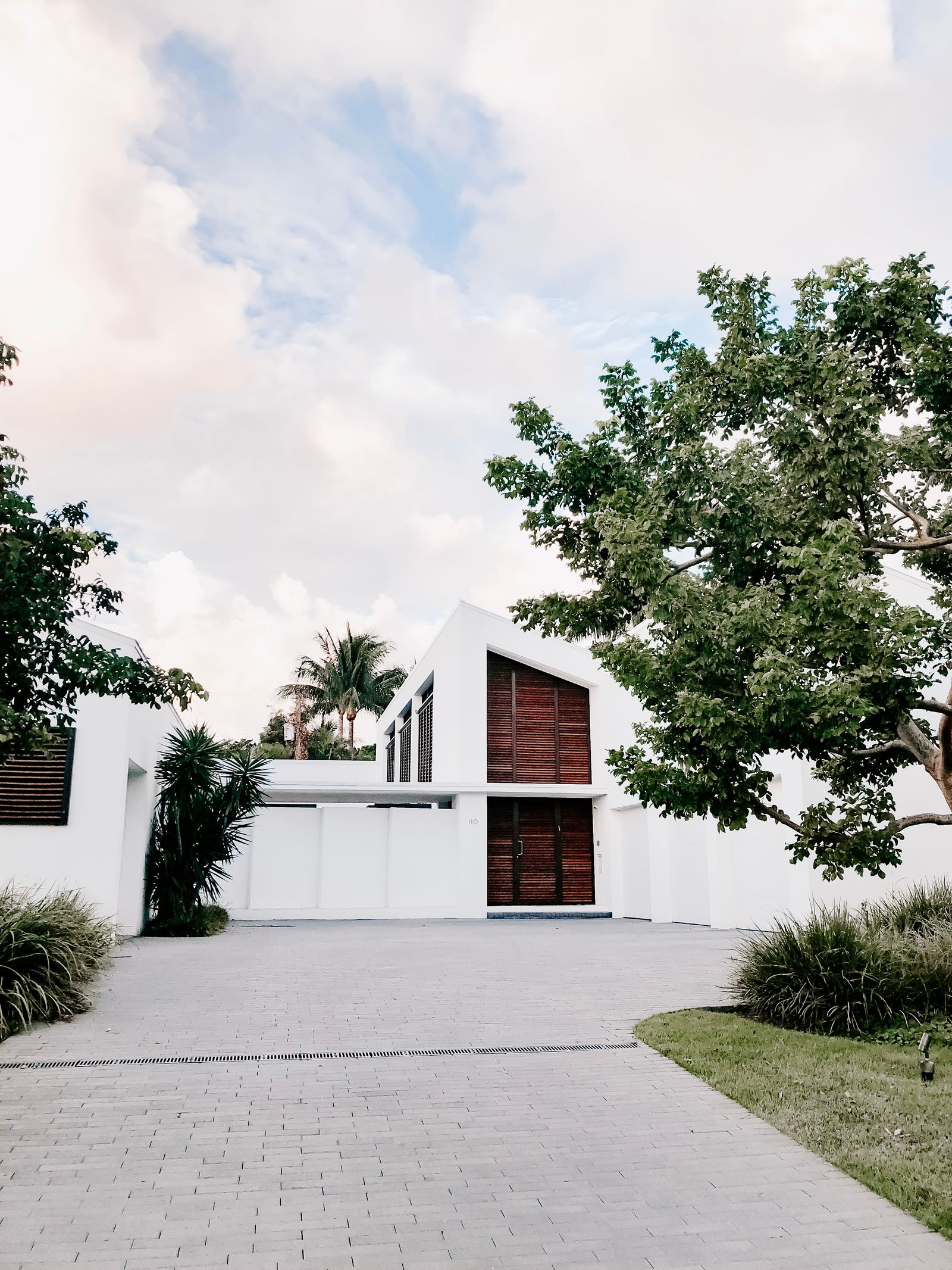Clean modern home exterior on a landscaped lot