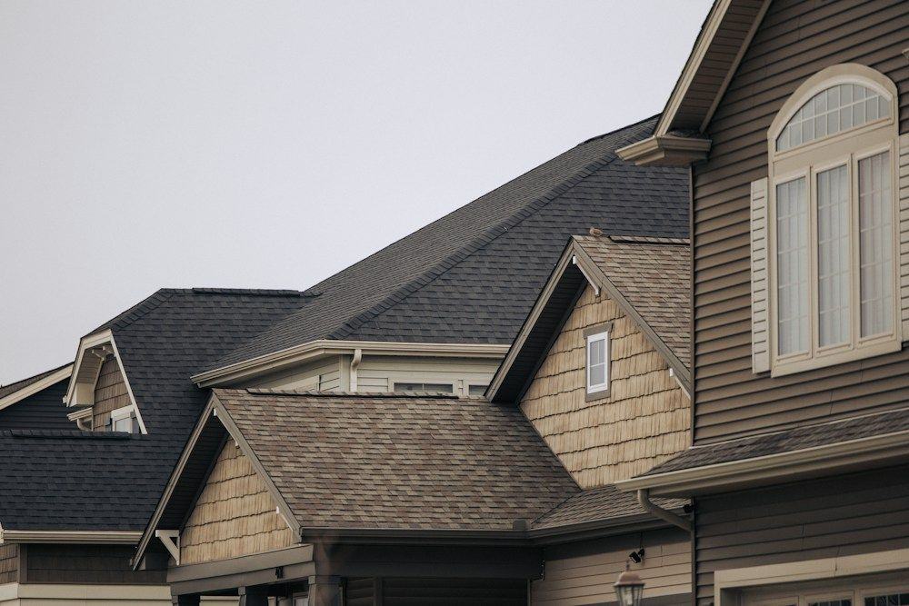 Row of newer homes with architectural shingle roofs